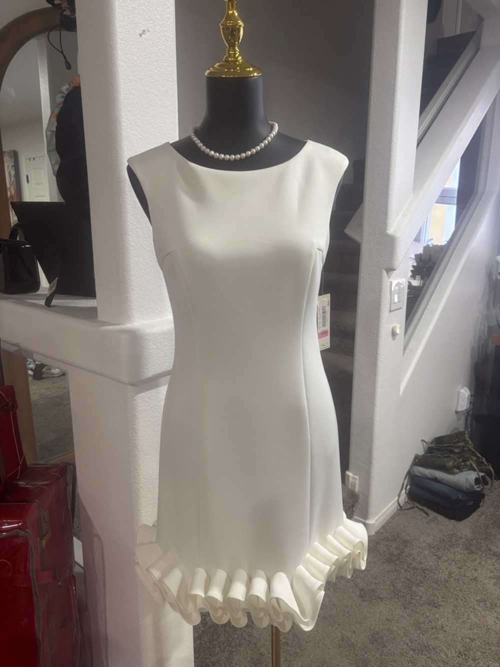 Elegant White Sleeveless Ruffle-Hem Dress